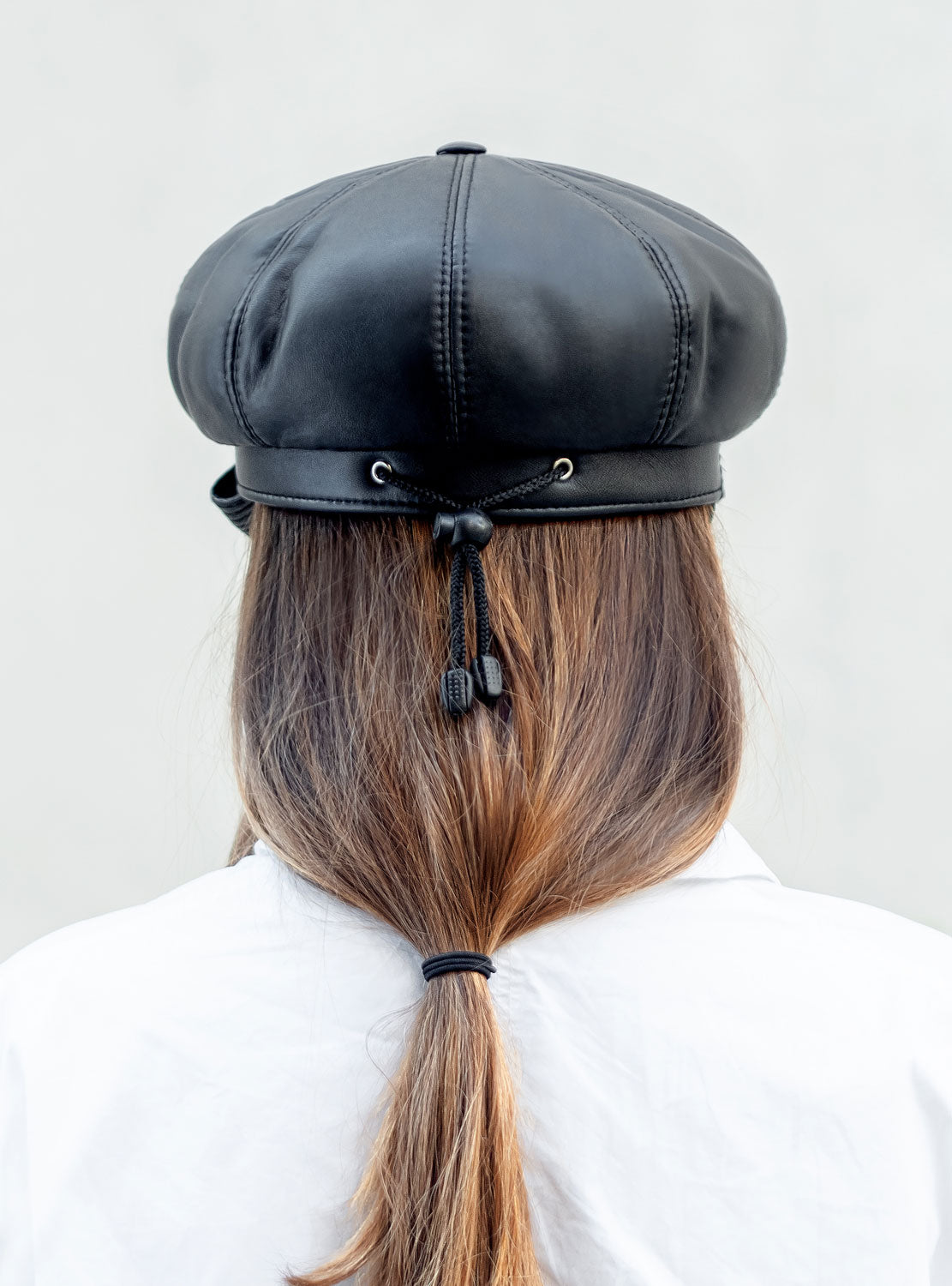 Leather cap with inverted peak